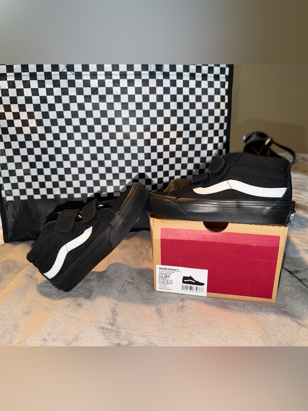 Boys Black and White Low-Top Vans Sneakers